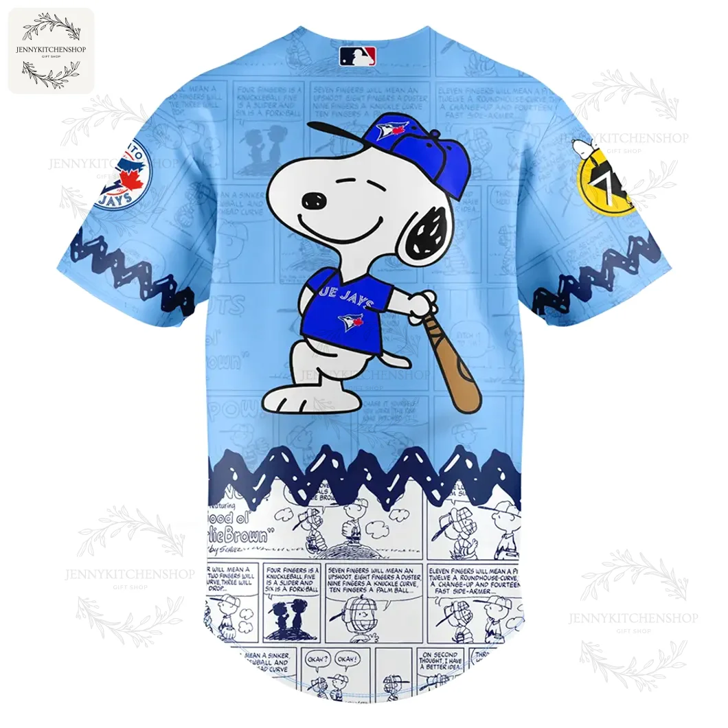 Back of the Toronto Blue Jays Peanuts Day jersey, featuring a large graphic of Snoopy in a Blue Jays uniform holding a baseball bat.