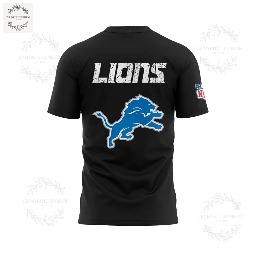 The back of the black Detroit Lions t-shirt, showing the word LIONS in a distressed font above a large blue team logo.