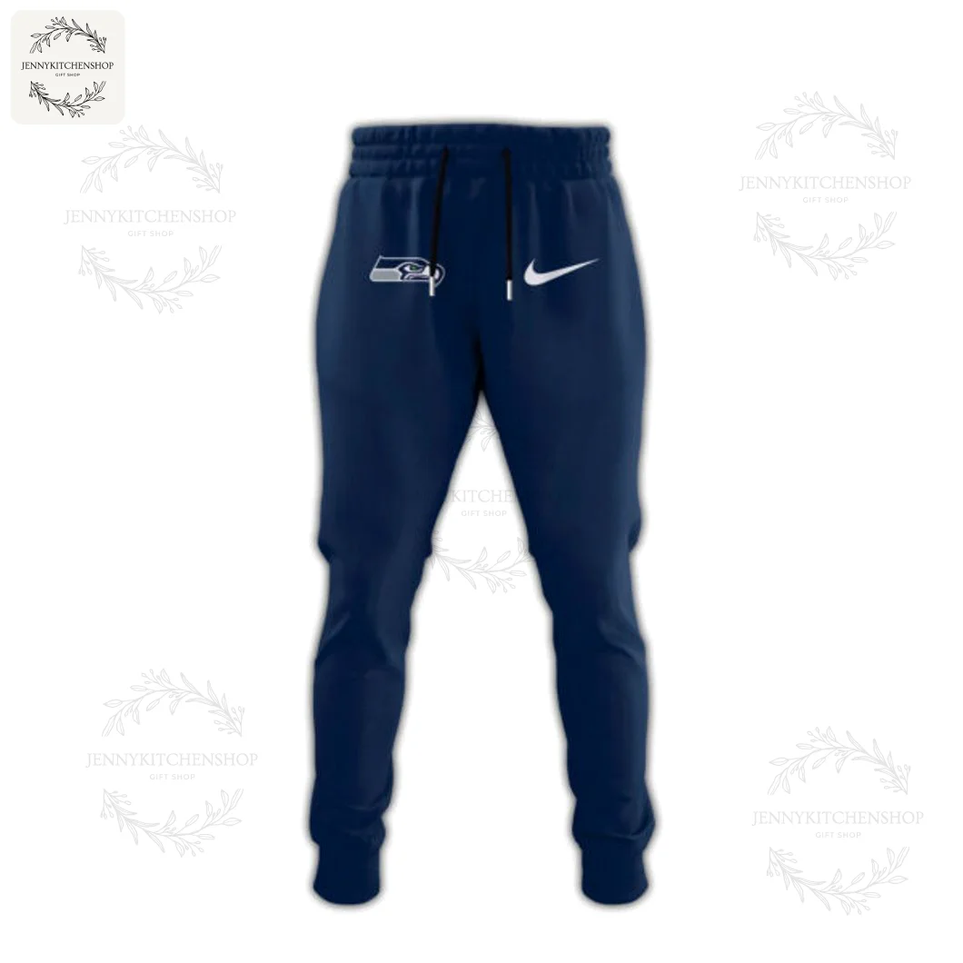 A pair of navy blue Seattle Seahawks joggers with the team logo and a white Nike swoosh on the upper left thigh.