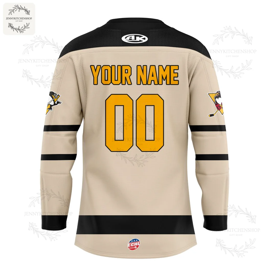 Back view of the Wheeling Nailers alternate hockey jersey. The beige jersey features a large gold 'W' and the ECHL logo at the hem.