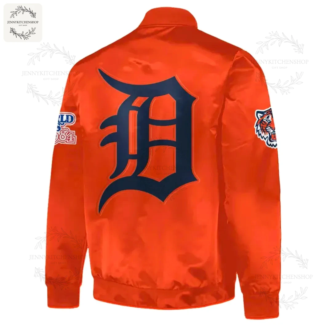 Back of the orange Detroit Tigers baseball jacket featuring the large, classic Old English "D" logo in the center.