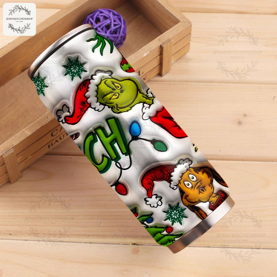 The Grinch can shaped tumbler resting in a wooden crate, showcasing the festive character design with the Grinch and his dog Max.